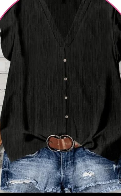Model wearing a black sleeveless button-front blouse
