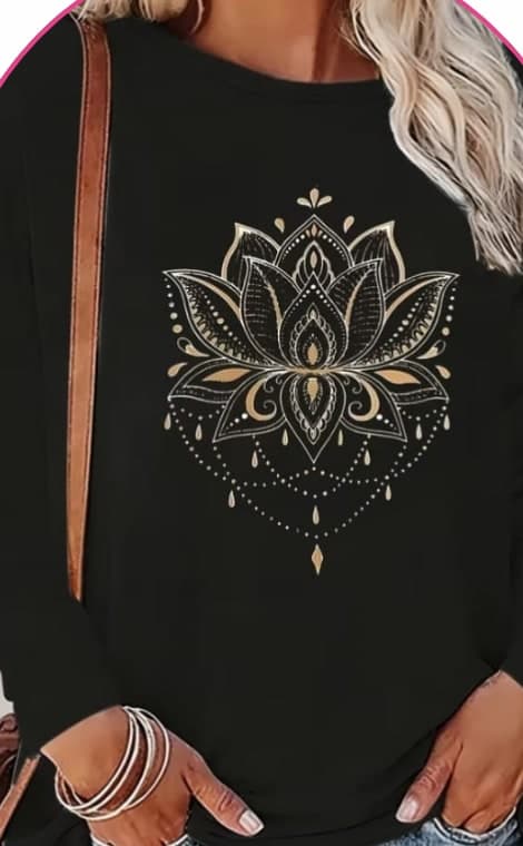 Model wearing a black long-sleeve top with a gold lotus mandala print