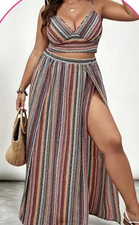 Model wearing a striped cami top and matching side-slit maxi skirt