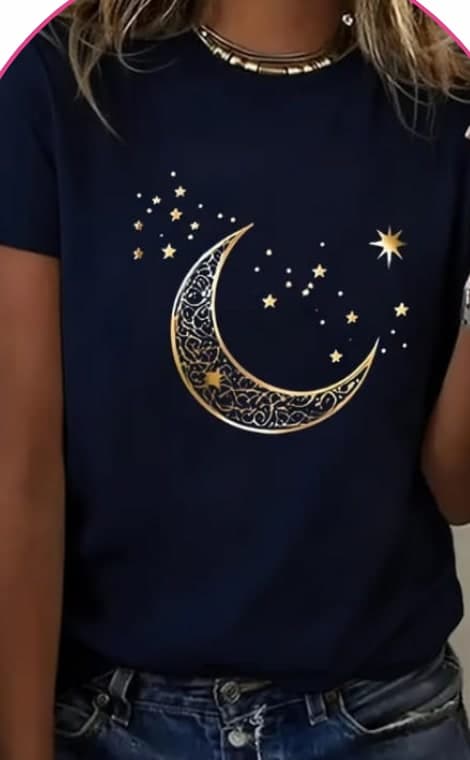 Model wearing a navy tee with a gold crescent moon and stars graphic