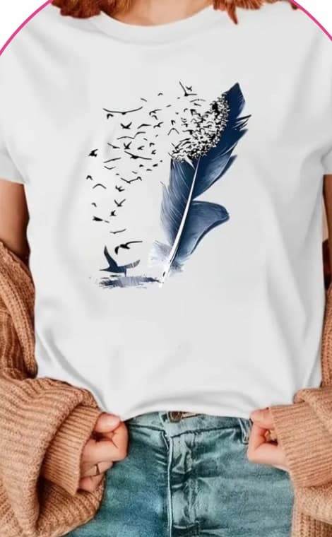 Model wearing a white tee with a feather and flying birds graphic