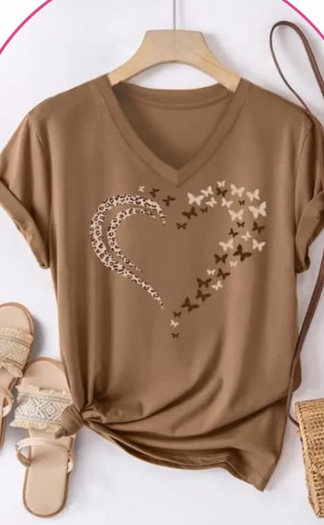 Model wearing a brown V-neck tee with a leopard and butterfly heart graphic