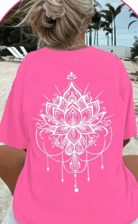 Model wearing a pink oversized tee with a white lotus mandala print on the back